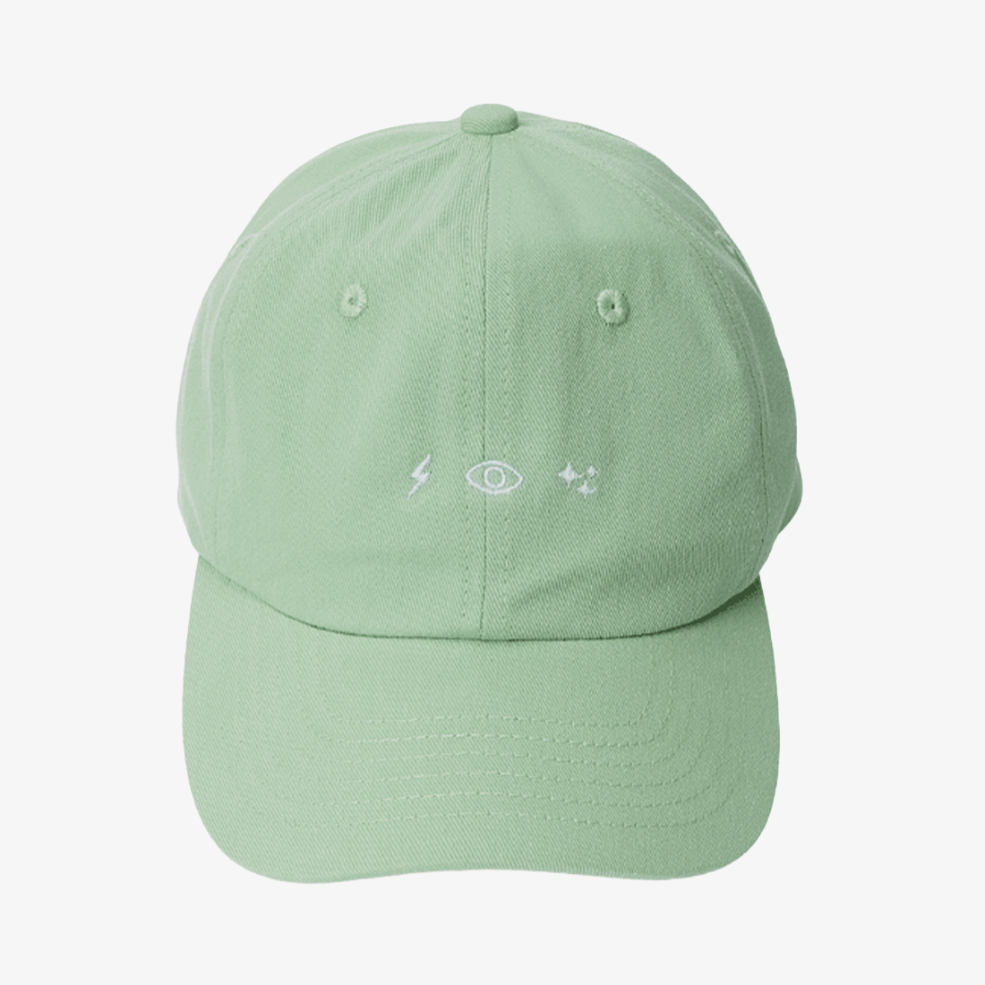 Matcha-green Energise Focus Glow dad cap with a vintage finish, curved brim and white embroidered lightning, eye and sparkle symbols.