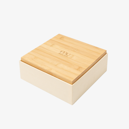 Closed Matcha Union Ceremony Set presentation box with a logo-engraved bamboo lid that doubles as a tray for matcha preparation.